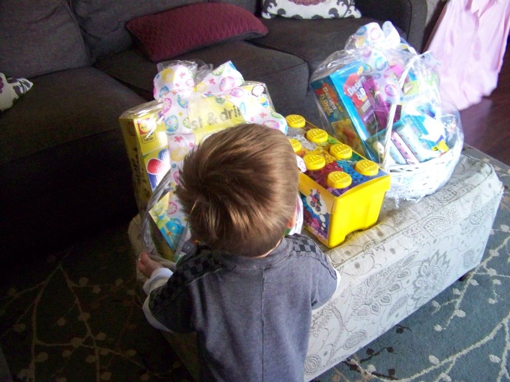 the boys opening Easter baskets