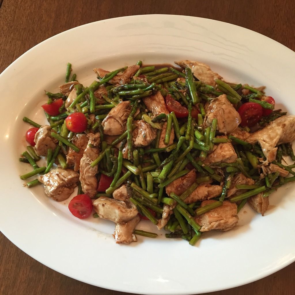 chicken and asparagus in a dish