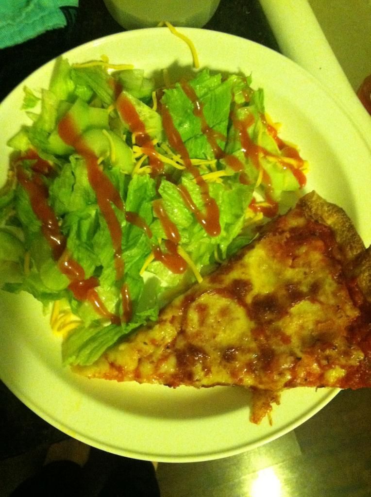 pizza and salad on a plate