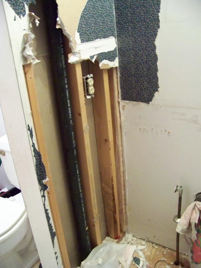the bathroom walls torn up
