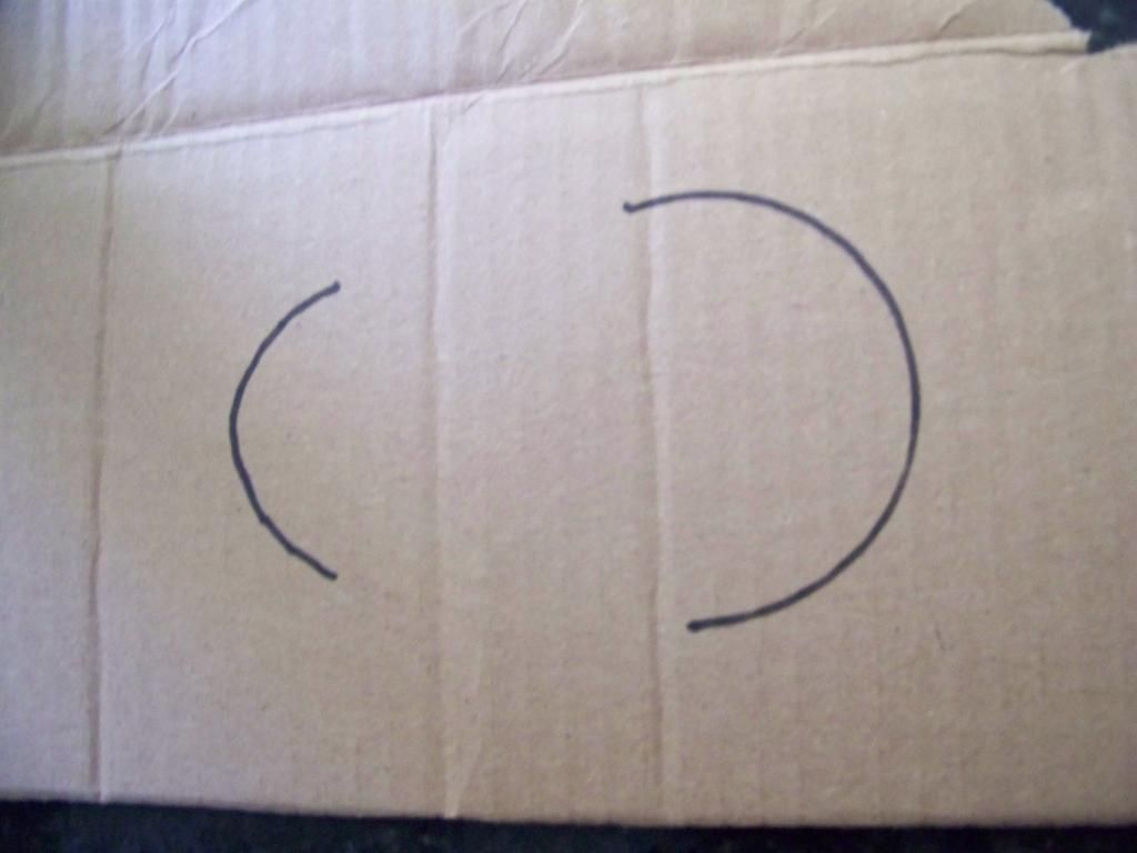the cardboard shape drawn in sharpie