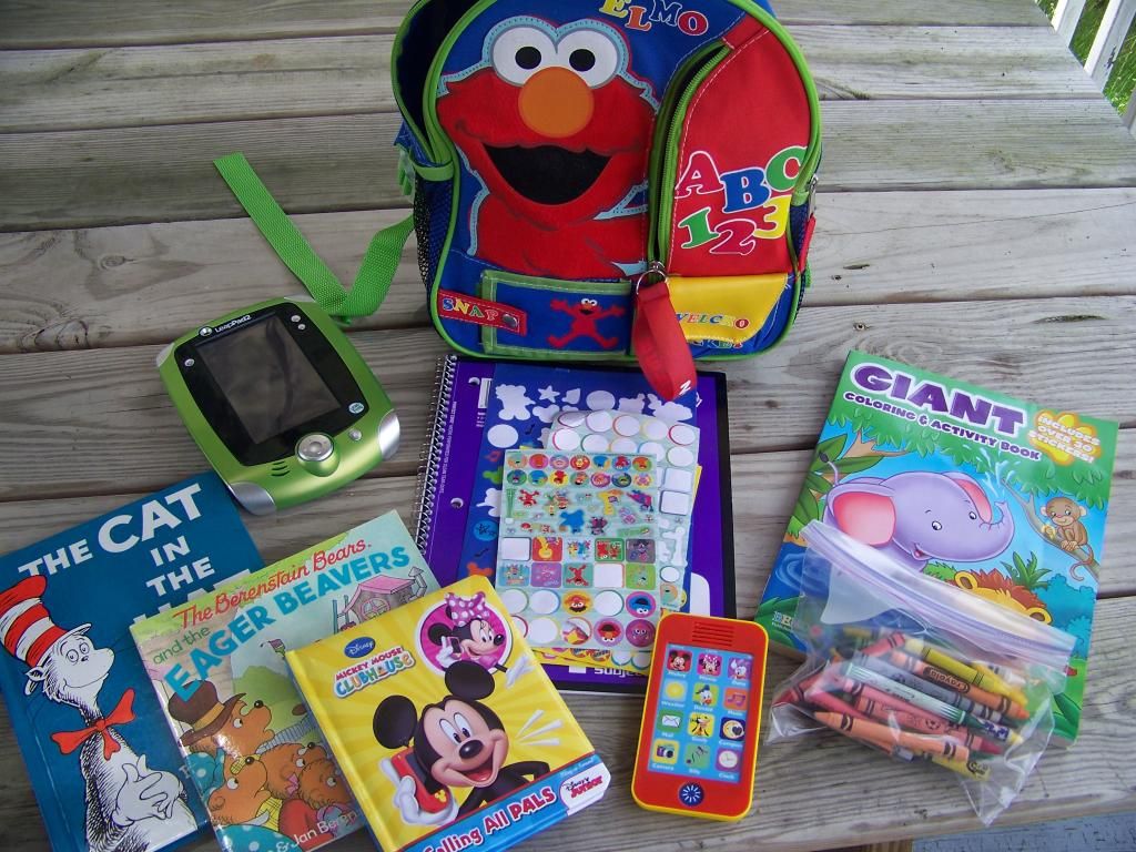 books and toys in the elmo backpack
